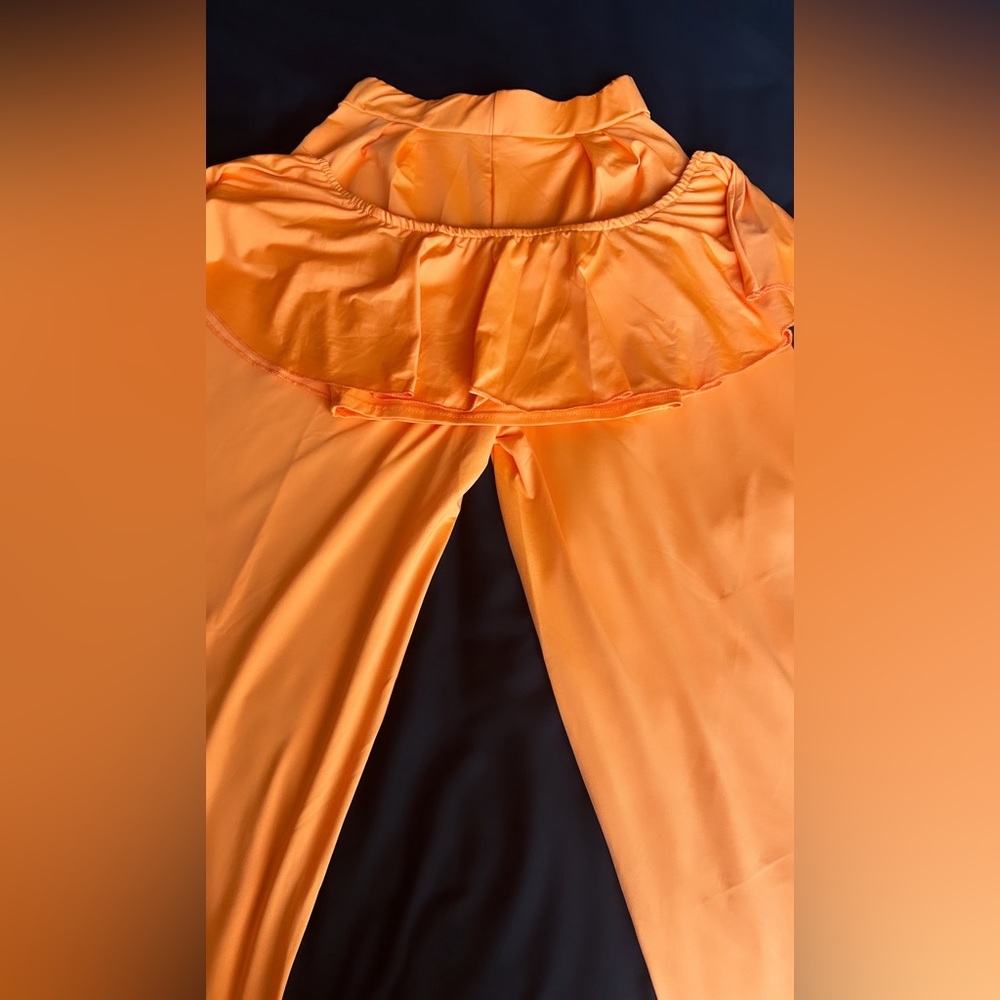 ORANGE HALTER JUMPSUIT WITH WIDE LEG BOTTOMS!